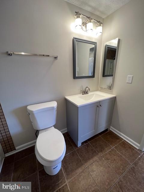 6627 Haydown Court Frederick, MD 21703 - Photo 17 of 30 a bathroom with a toilet sink and mirror