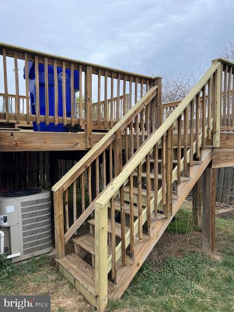 6627 Haydown Court Frederick, MD 21703 - Photo 23 of 30 a view of staircase with wooden floor and white walls
