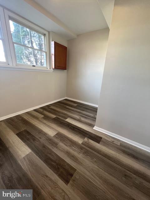6627 Haydown Court Frederick, MD 21703 - Photo 26 of 30 a view of a bedroom with wooden floor and a window