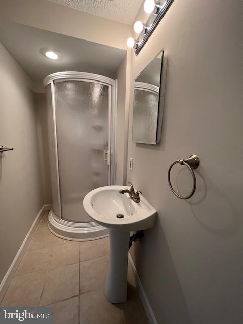 6627 Haydown Court Frederick, MD 21703 - Photo 28 of 30 a bathroom with a sink toilet and mirror