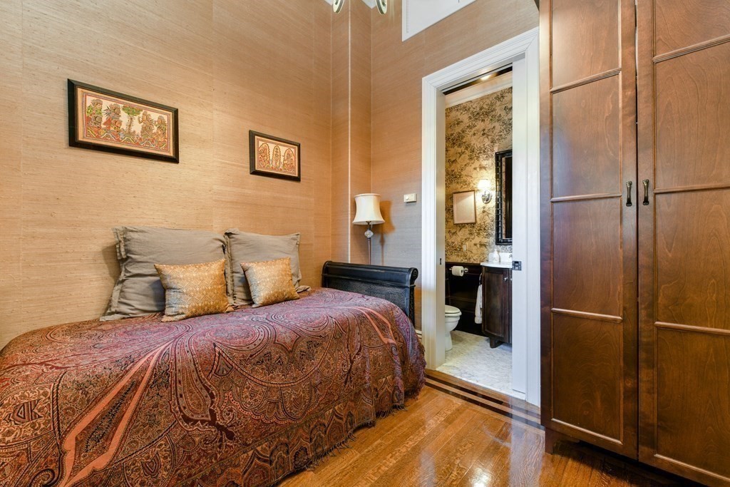 88 Beacon Street, Unit 3 Boston, MA 02108 - Photo 23 of 28 a bedroom with a bed and a refrigerator