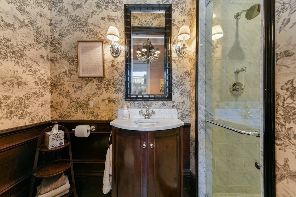 88 Beacon Street, Unit 3 Boston, MA 02108 - Photo 24 of 28 a bathroom with a sink and a mirror