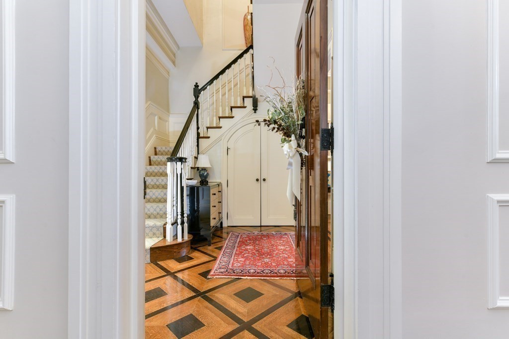 88 Beacon Street, Unit 3 Boston, MA 02108 - Photo 3 of 28 a view of a hallway with wooden floor and entryway