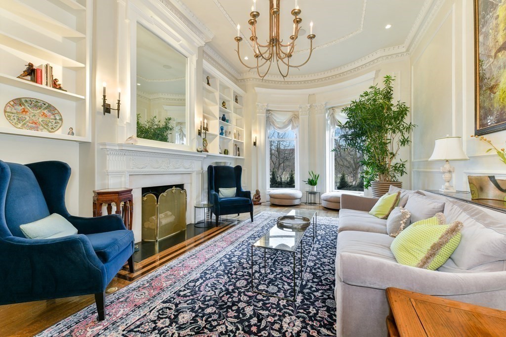88 Beacon Street, Unit 3 Boston, MA 02108 - Photo 4 of 28 a living room with furniture a chandelier and a fireplace