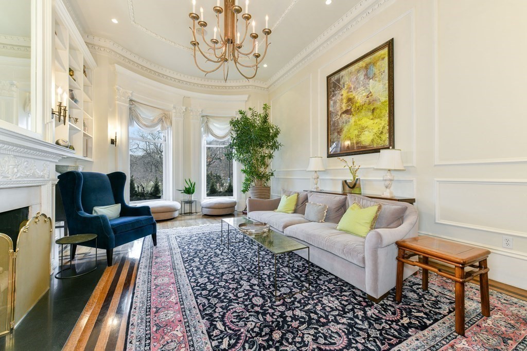 88 Beacon Street, Unit 3 Boston, MA 02108 - Photo 5 of 28 a living room with furniture a fireplace and a chandelier