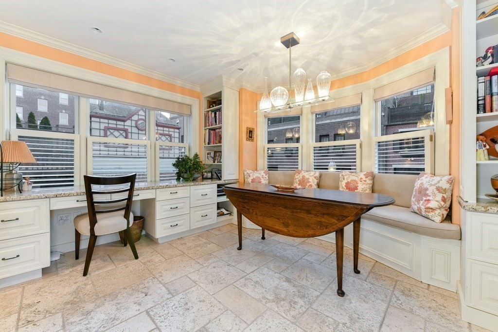88 Beacon Street, Unit 3 Boston, MA 02108 - Photo 9 of 28 a living room with furniture a rug and a large window