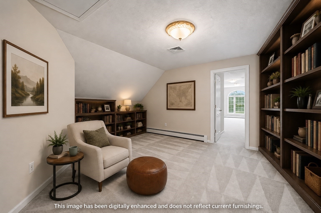270 Mendon Road Sutton, MA 01590 - Photo 26 of 42 a living room with furniture and a book shelf