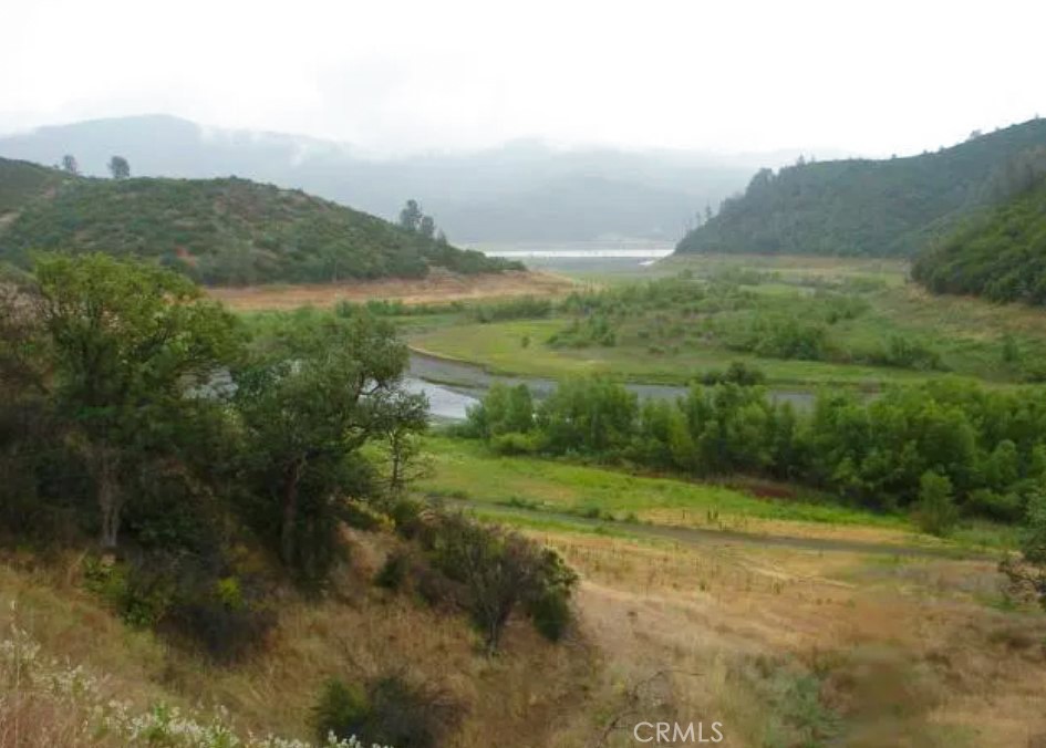 a view of a lake with a mountain in the background