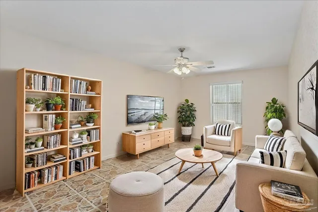 a view of a house with a yard and pathway