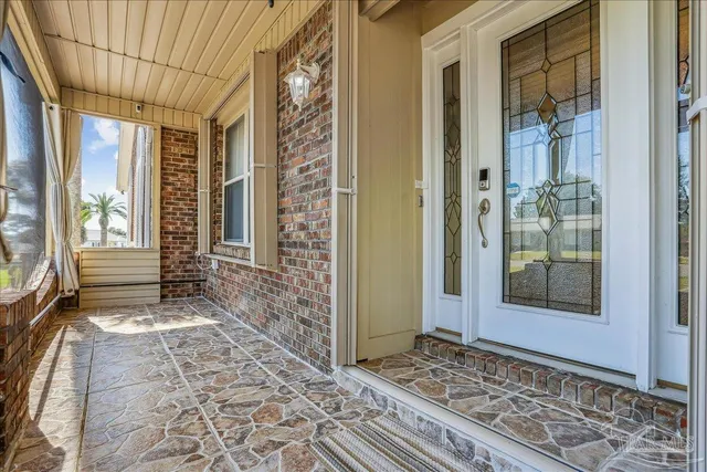 a view of an empty room with a fireplace