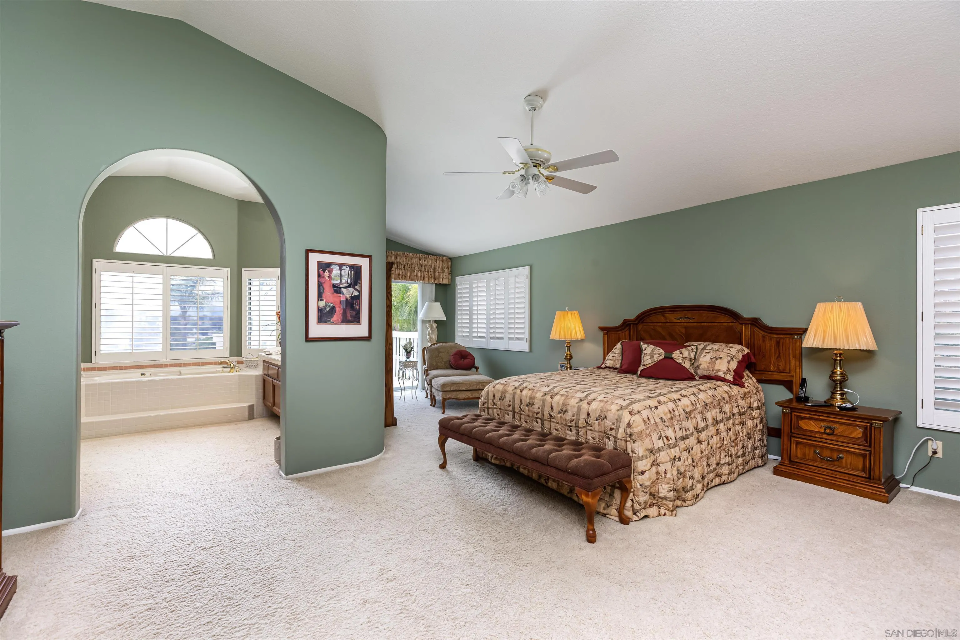 41411 Rue Jadot Temecula, CA 92591 - Photo 20 of 54 a bedroom with a bed and a chandelier