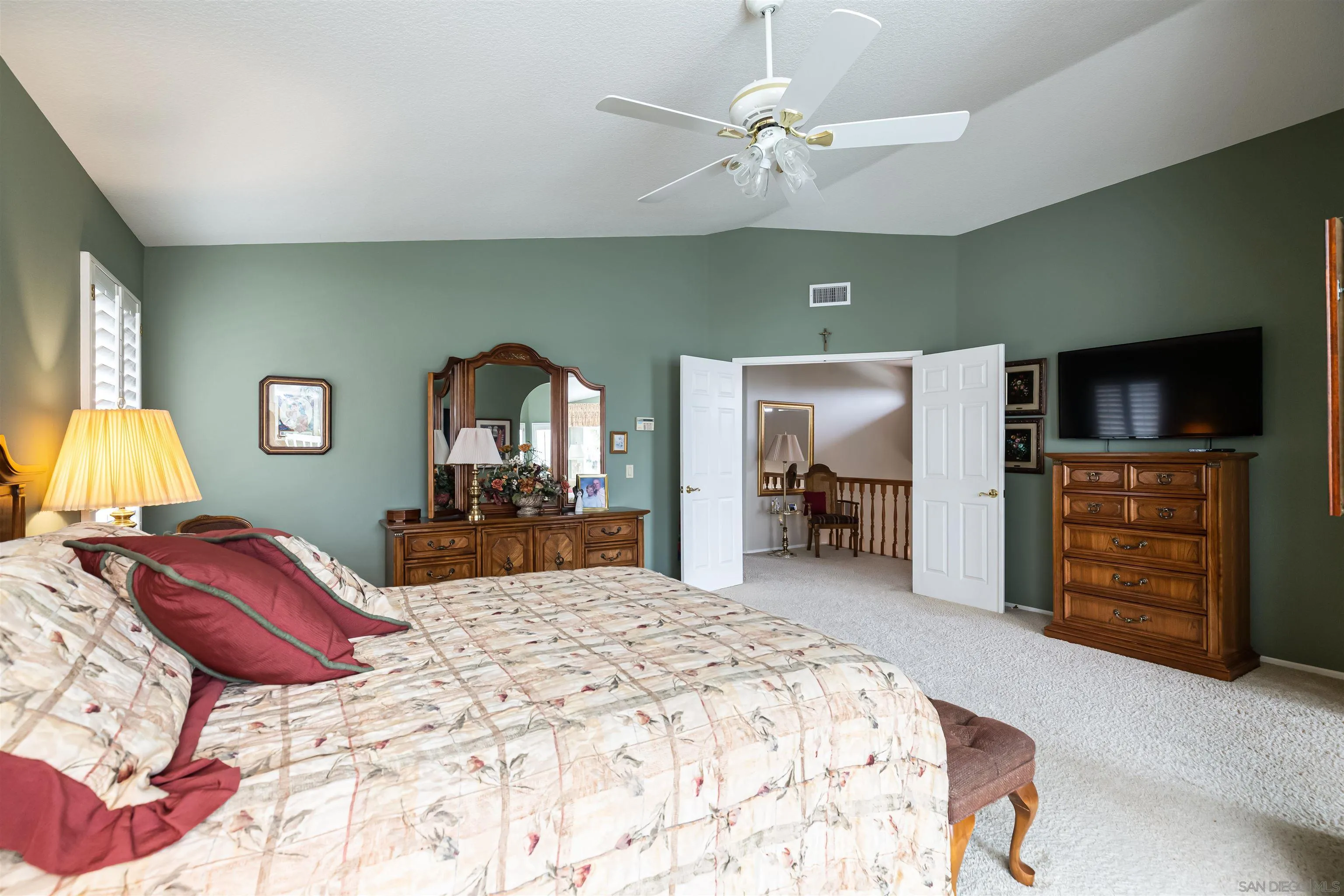 41411 Rue Jadot Temecula, CA 92591 - Photo 21 of 54 a bedroom with a bed and a flat screen tv
