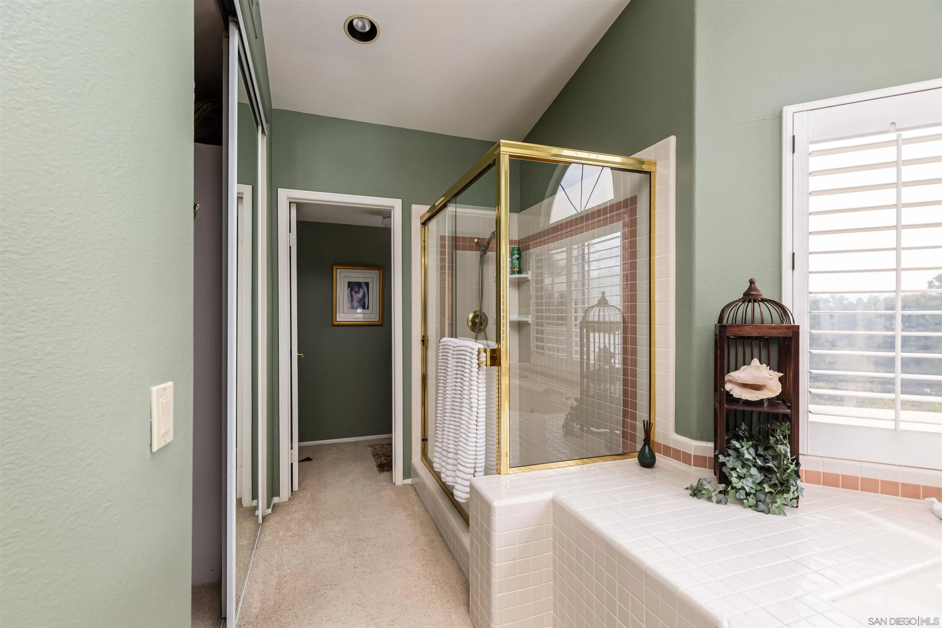 41411 Rue Jadot Temecula, CA 92591 - Photo 25 of 54 hallway with wooden floor and cabinets