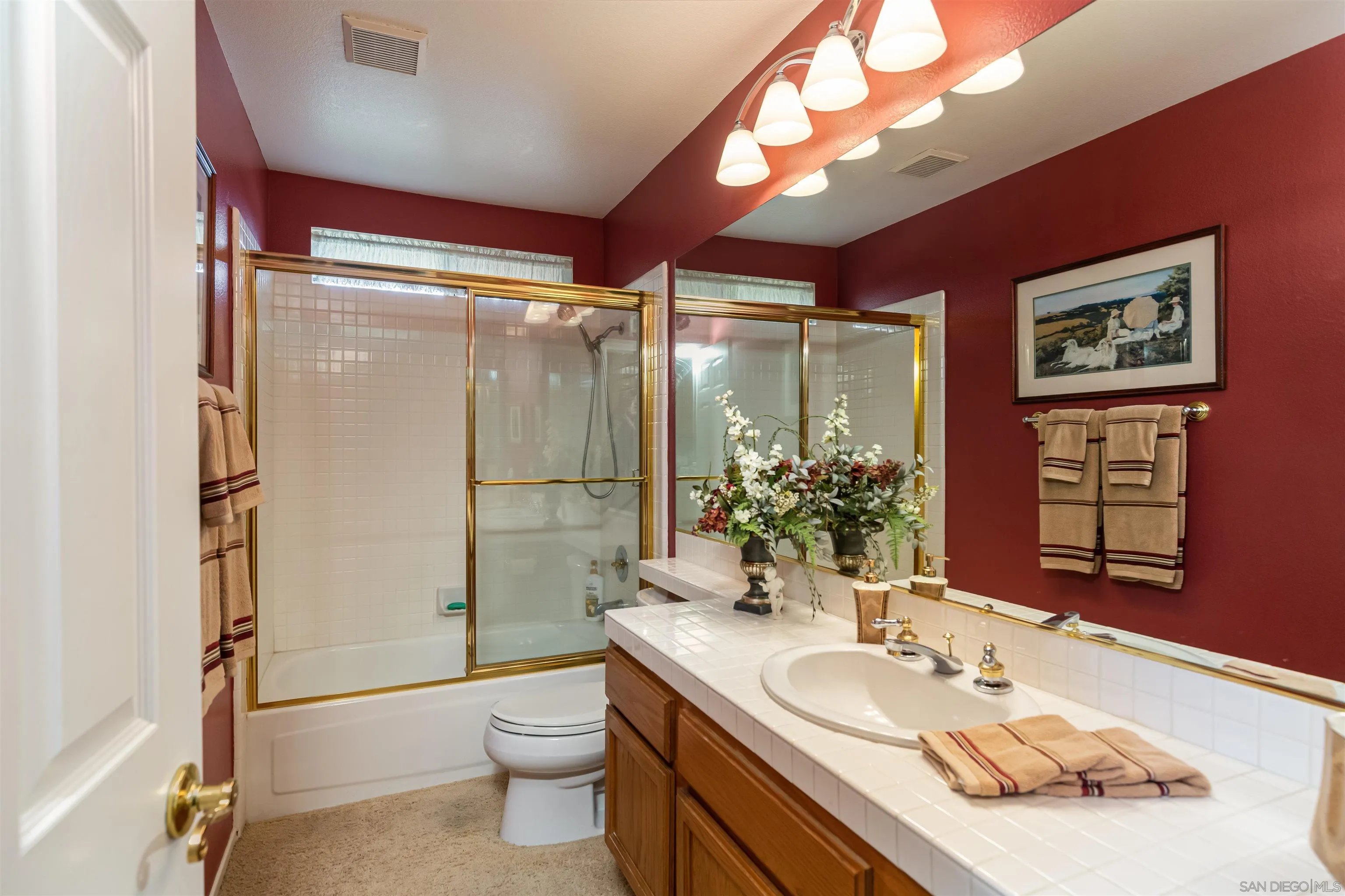 41411 Rue Jadot Temecula, CA 92591 - Photo 28 of 54 a bathroom with a granite countertop sink toilet and shower