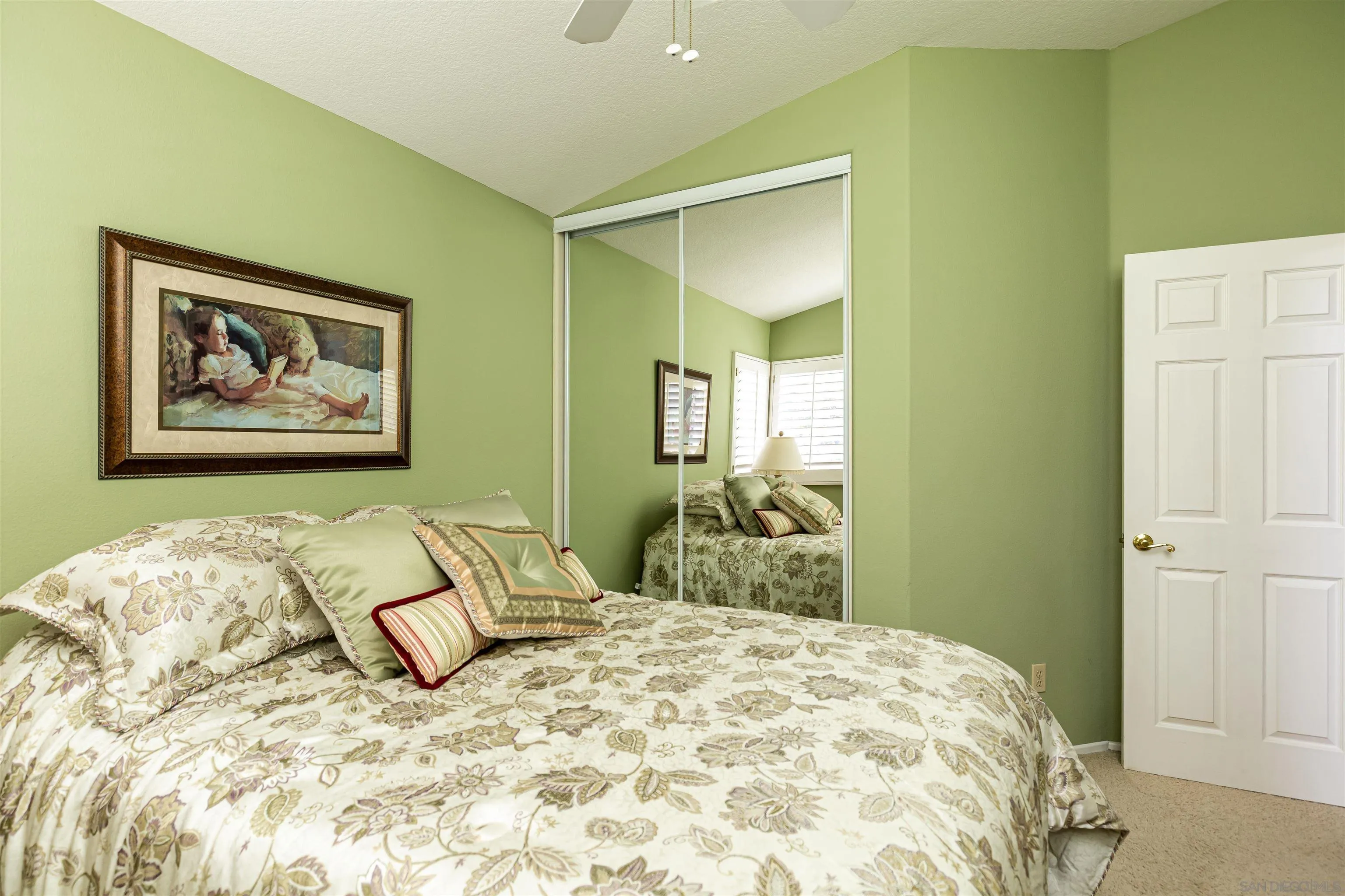 41411 Rue Jadot Temecula, CA 92591 - Photo 30 of 54 a bedroom with a bed and painting on the wall