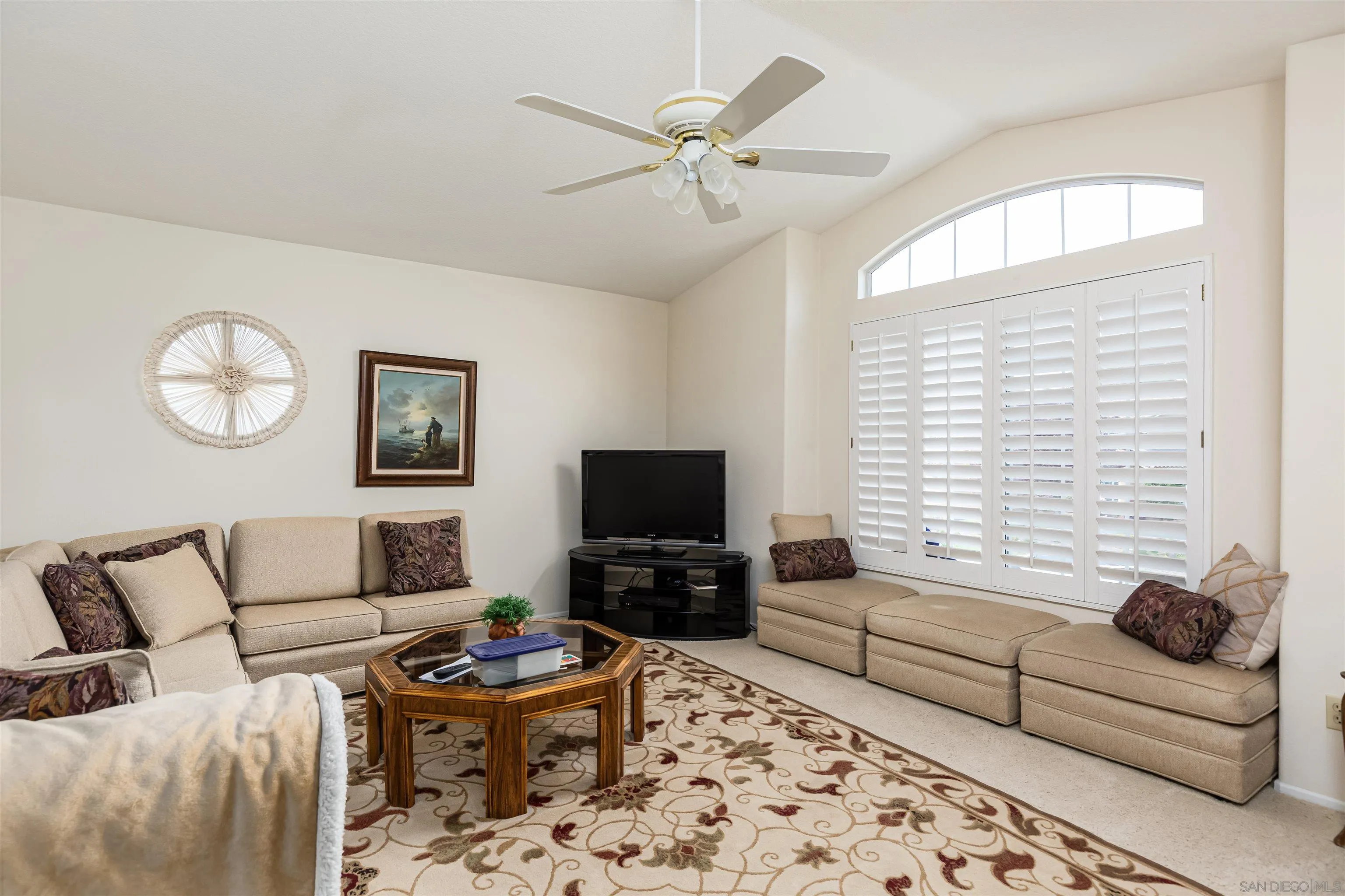 41411 Rue Jadot Temecula, CA 92591 - Photo 31 of 54 a living room with furniture and a flat screen tv