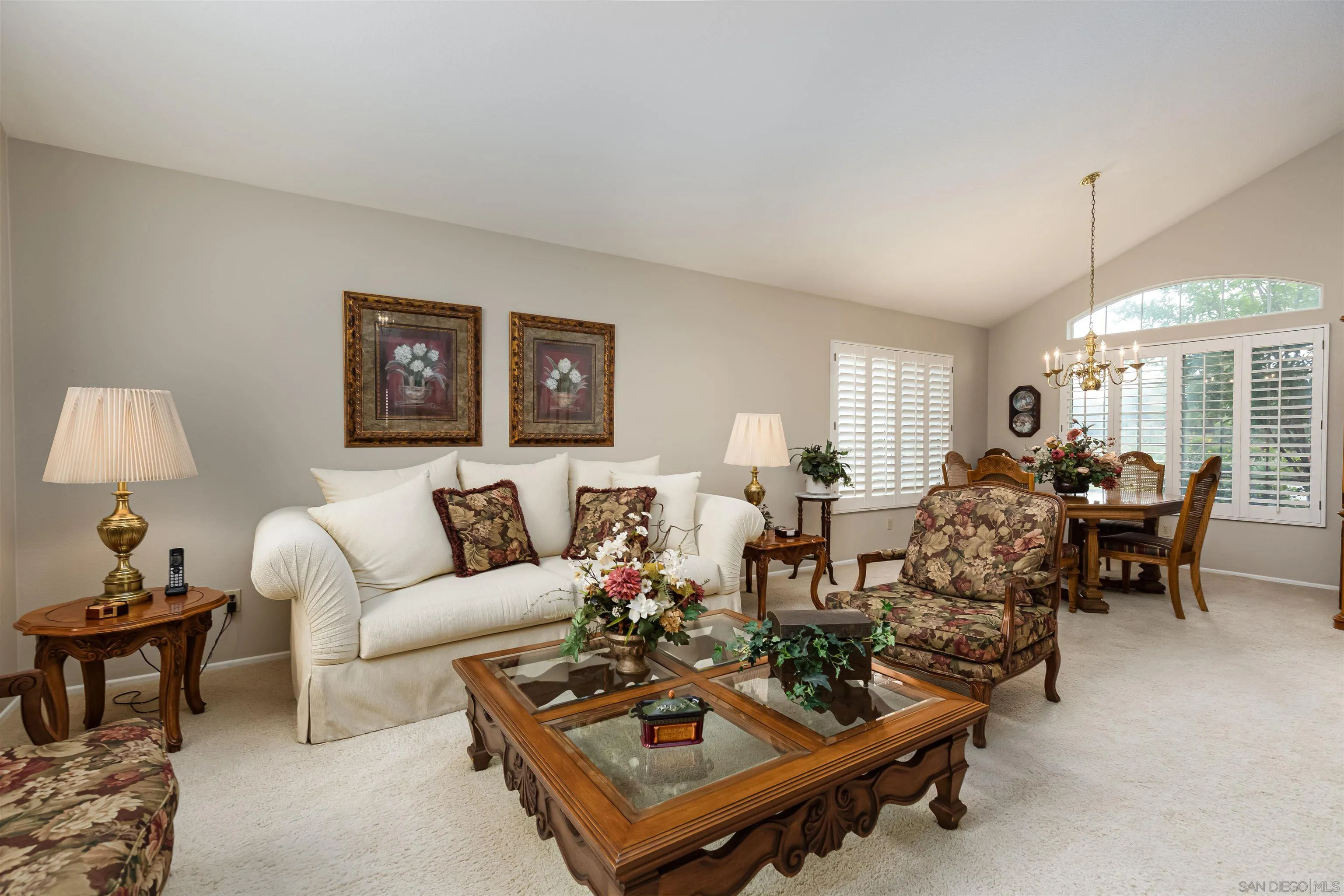 41411 Rue Jadot Temecula, CA 92591 - Photo 4 of 54 a living room with furniture a dining table and a window