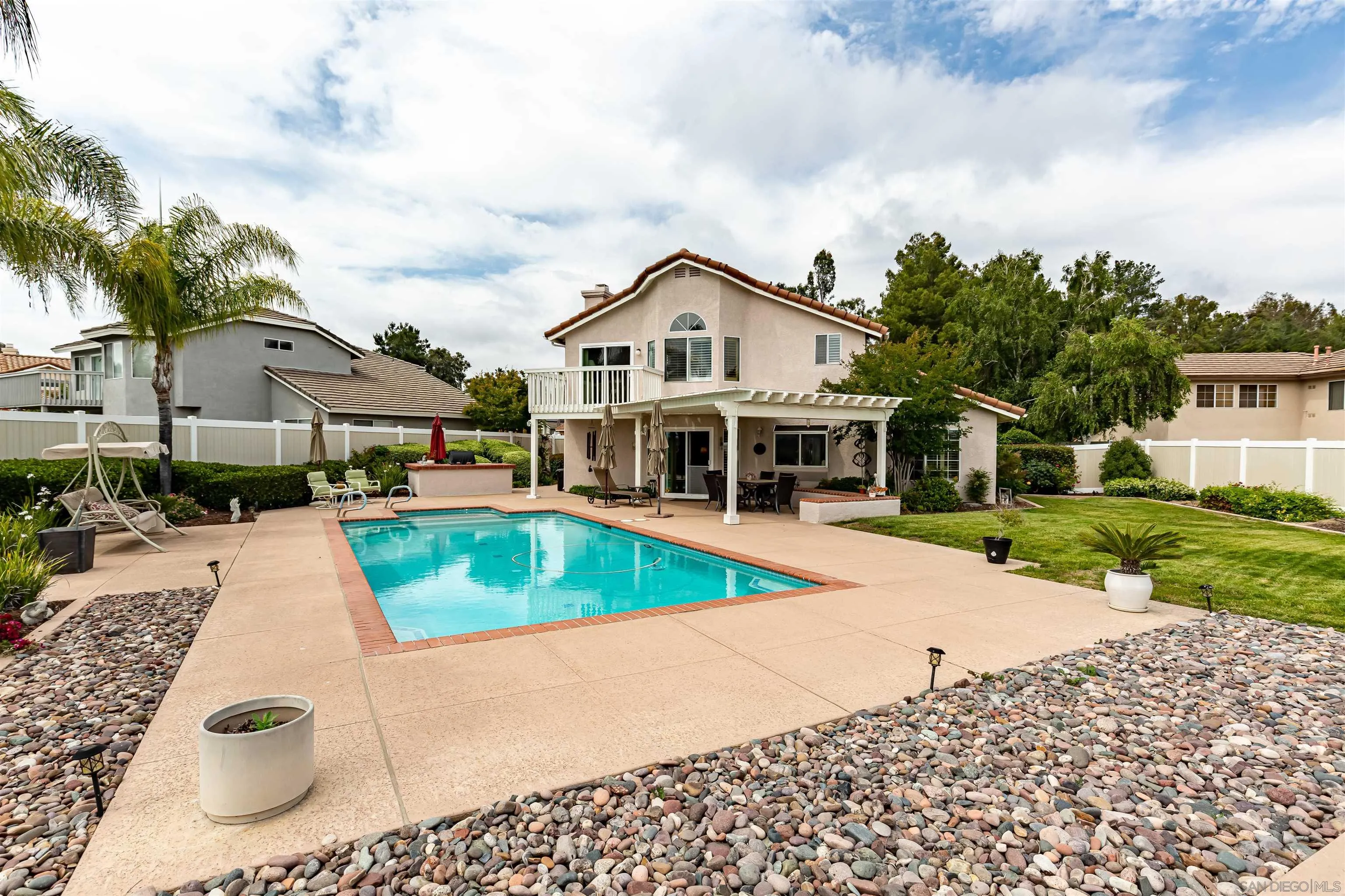 41411 Rue Jadot Temecula, CA 92591 - Photo 41 of 54 a front view of a house with a yard