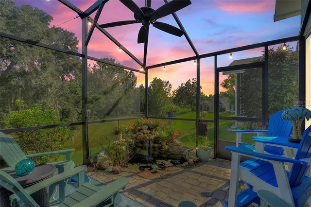 a view of a couches and table in the patio
