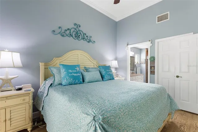 a bathroom with a granite countertop sink a toilet and a mirror