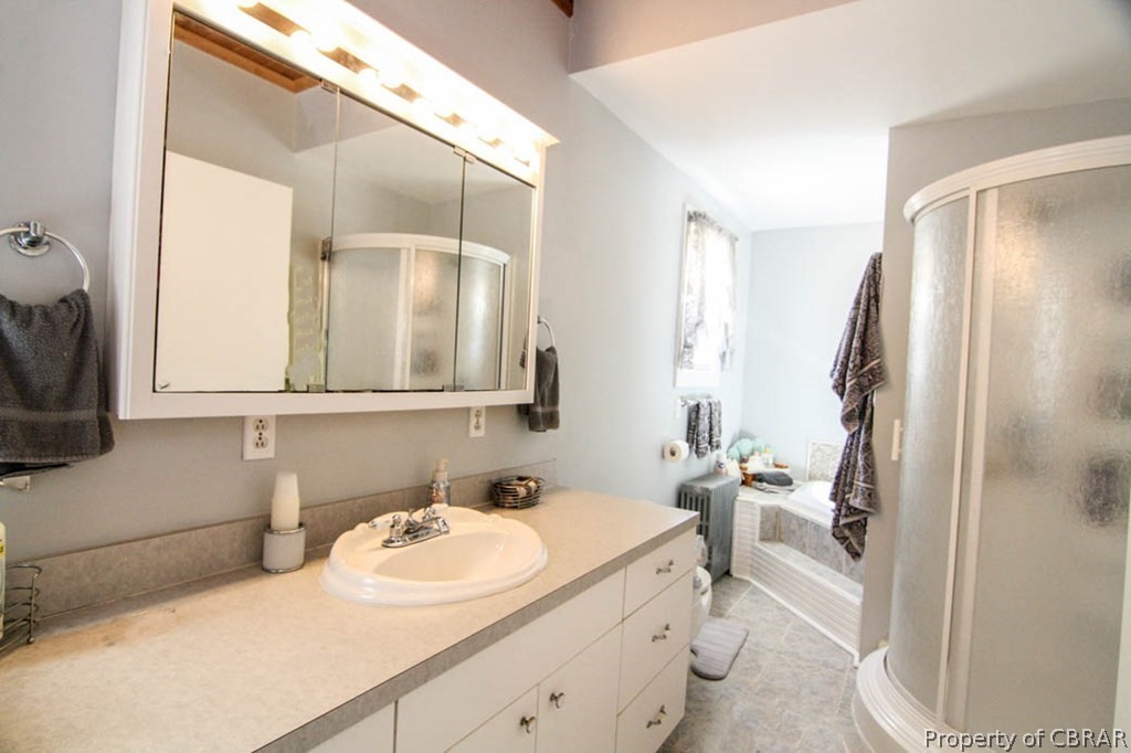 18 Browns Store Road Heathsville, VA 22473 - Photo 30 of 42 a bathroom with a sink and a mirror