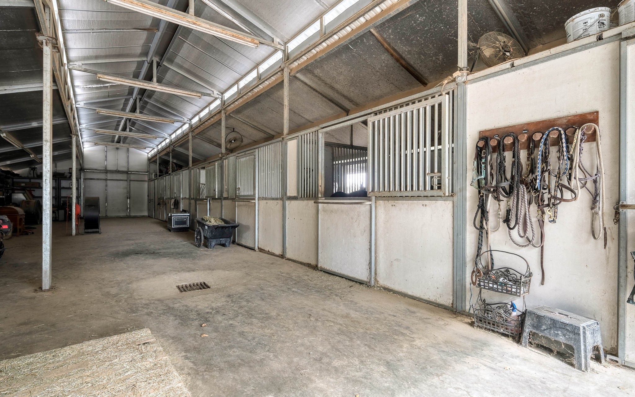 22474 Kmiec Road Hempstead, TX 77445 - Photo 44 of 50 5 stalls, tack room & storage room on one side. Room on opposite side for additional stalls.
