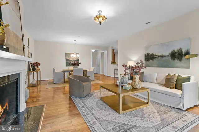 a view of a swimming pool with outdoor seating