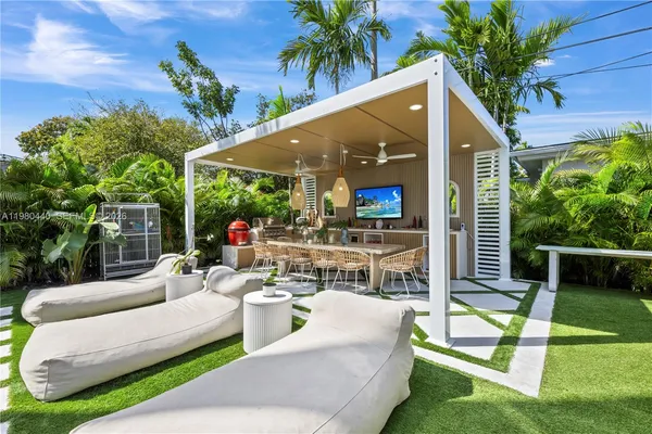 a outdoor living space with furniture and garden view