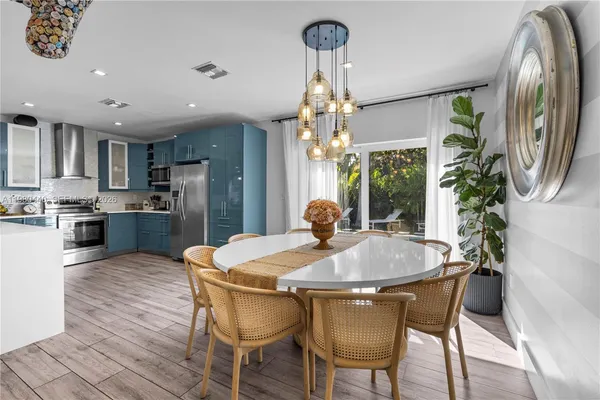 a bedroom with bed and window