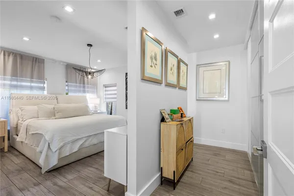 a living room with a rug floor and a rug
