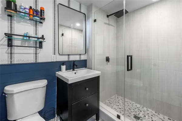 a view of a chairs and table in a patio