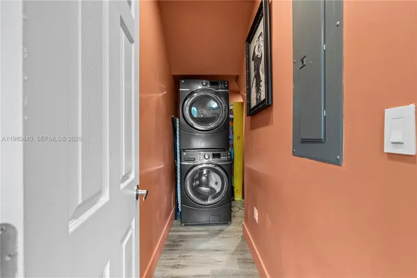 a front view of a house with a yard and a garage