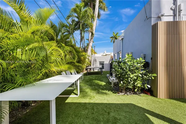 a view of a street with a building in the background