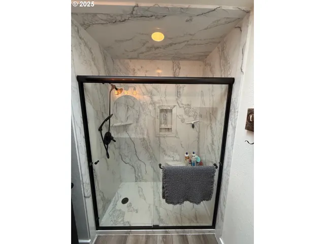 a bathroom with a sink a toilet and a bathtub