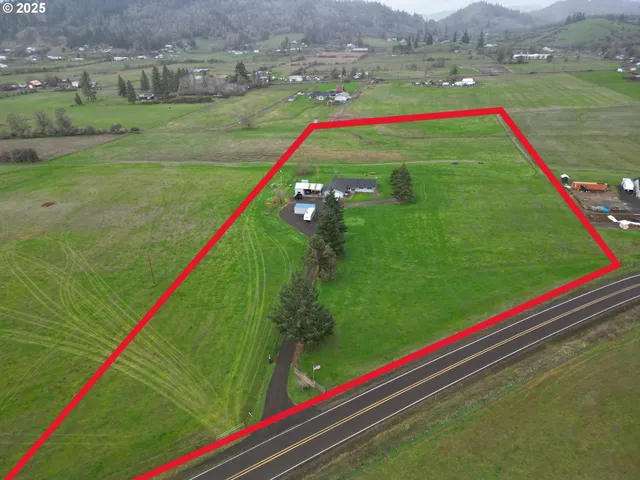 a view of a town with an ocean