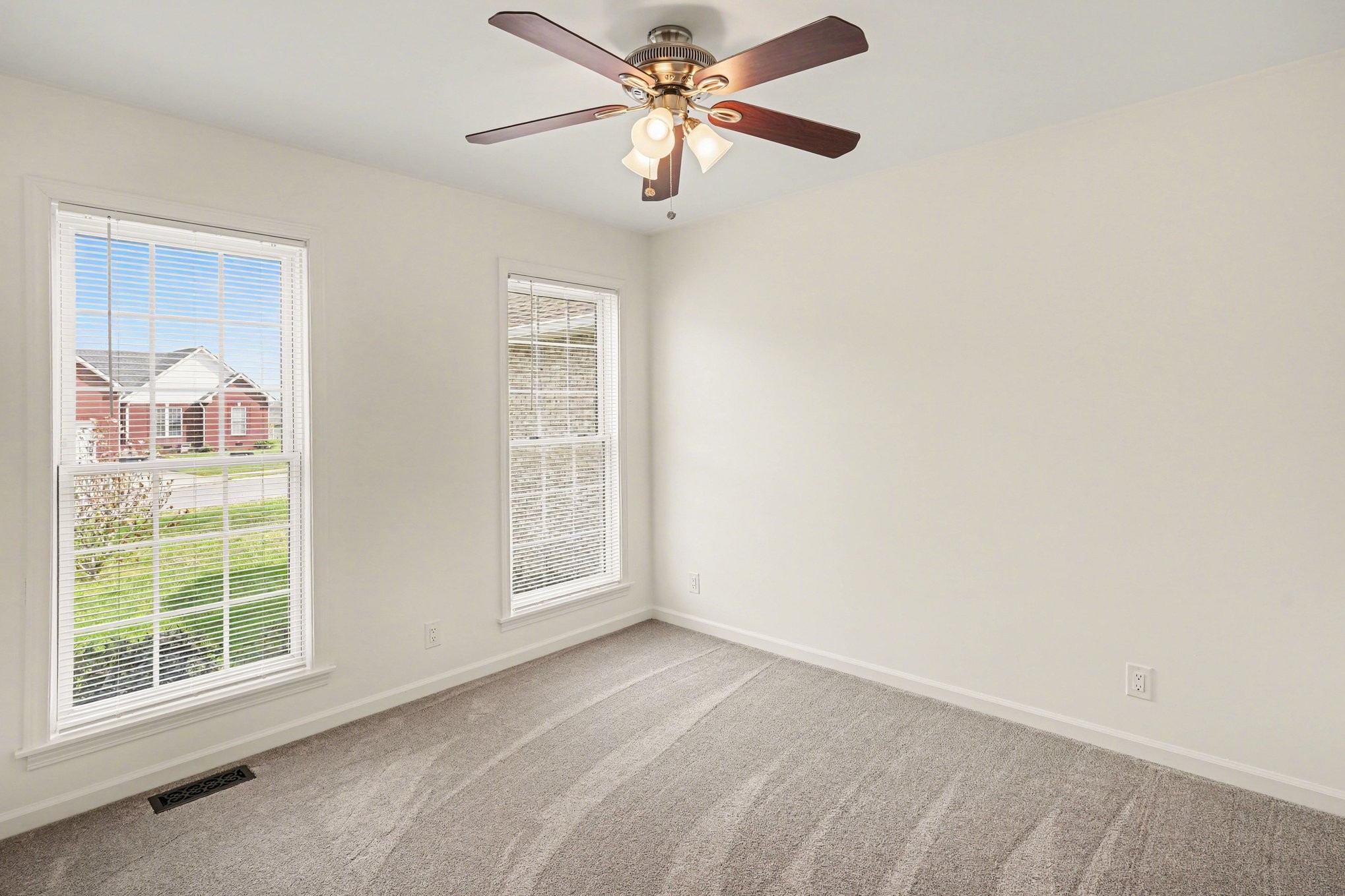 161 Fieldstone Lane Springfield, TN 37172 - Photo 17 of 26 an empty room with windows and fan