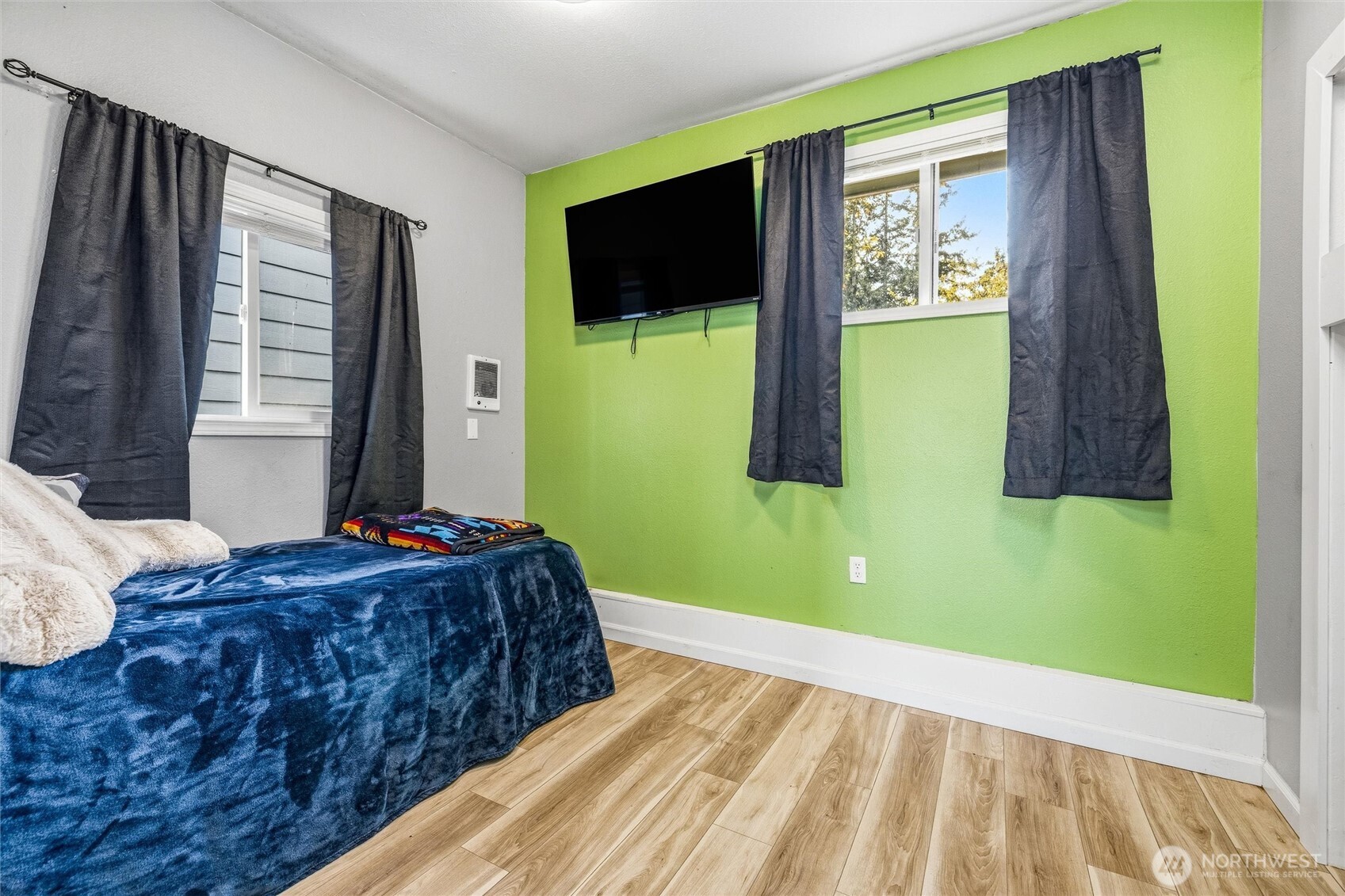 113 South Gardner Road Burlington, WA 98233 - Photo 15 of 40 a bedroom with a bed and windows