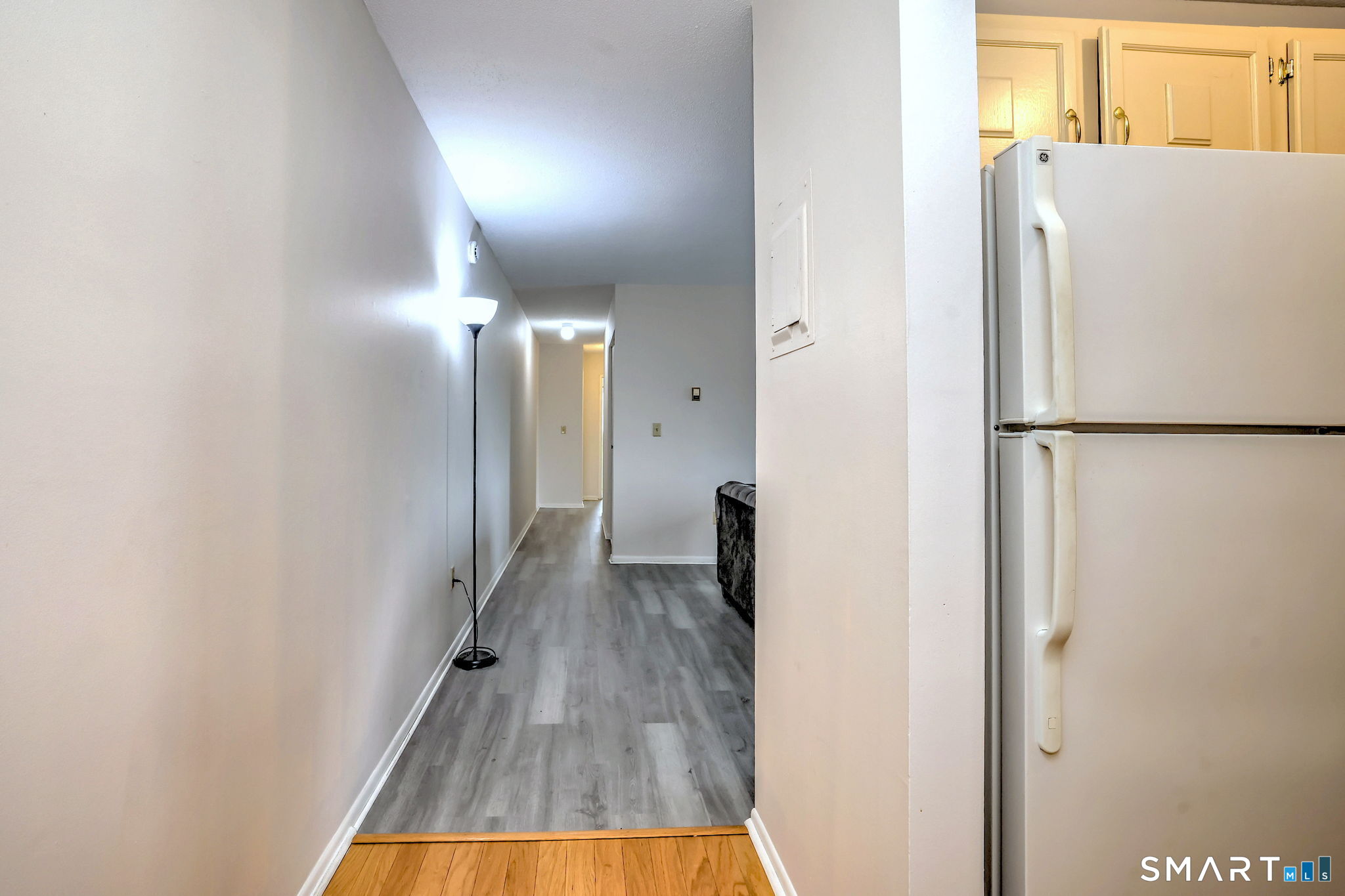 43 Balance Rock Road, Unit 11 Seymour, CT 06483 - Photo 8 of 40 a view of hallway with wooden floor
