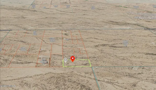 a bathroom with a white toilet and a shower