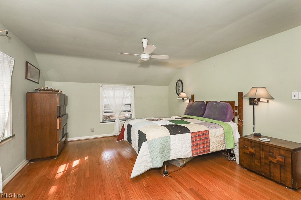 3187 Rumson Road Cleveland, OH 44118 - Photo 21 of 29 Hardwood floored bedroom featuring ceiling fan and vaulted ceiling