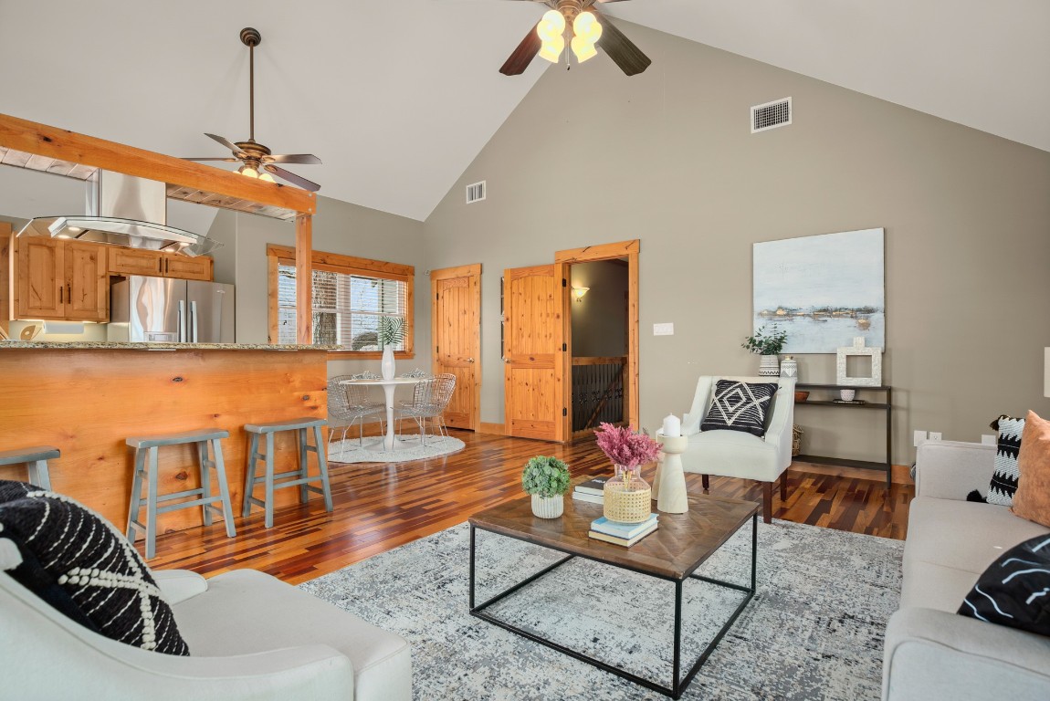 912 East 51st Street Austin, TX 78751 - Photo 30 of 38 a living room with furniture a dining table and a rug