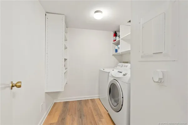a utility room with dryer and washer