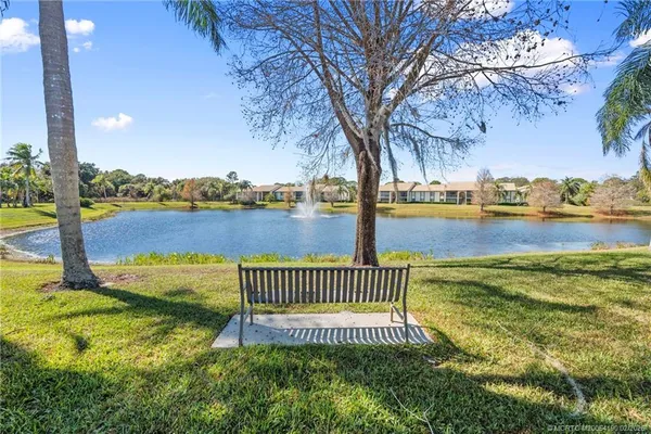 a view of a yard with lake view