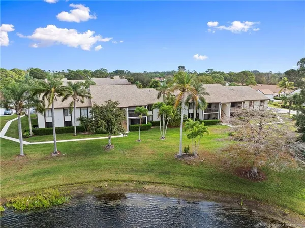a view of a house with a big yard