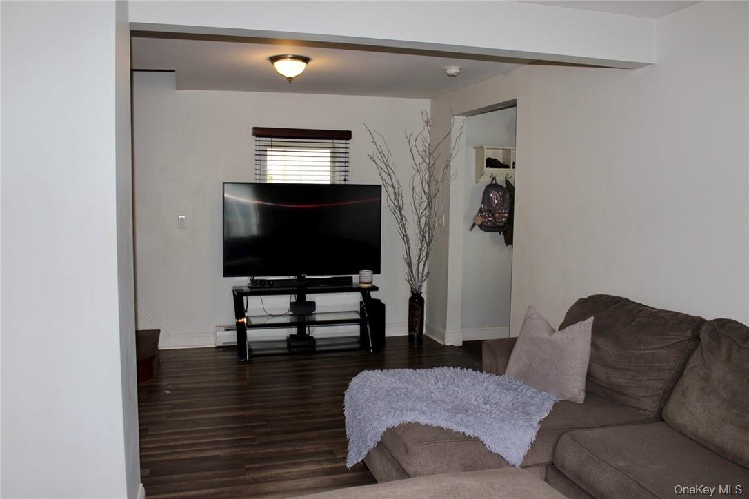 5834 Albany Post Road Cortlandt Manor, NY 10567 - Photo 6 of 14 Living room with dark hardwood / wood-style floors