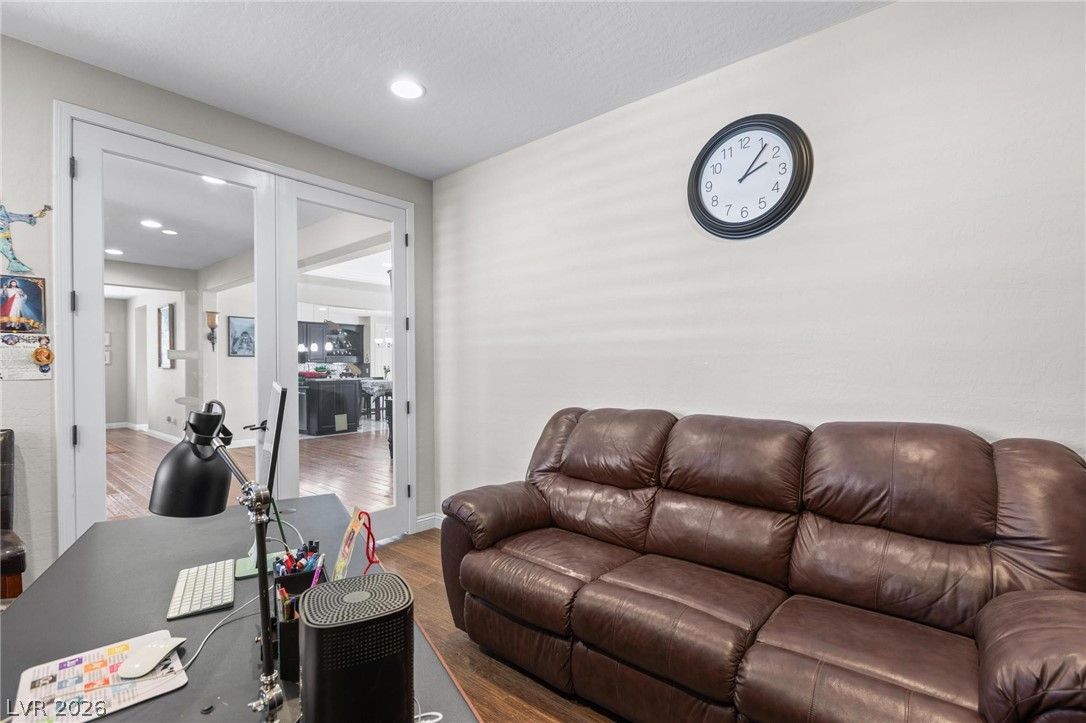 8431 Durango Ranch Court Las Vegas, NV 89113 - Photo 26 of 49 This versatile room offers hardwood flooring, recessed lighting, and elegant French doors.