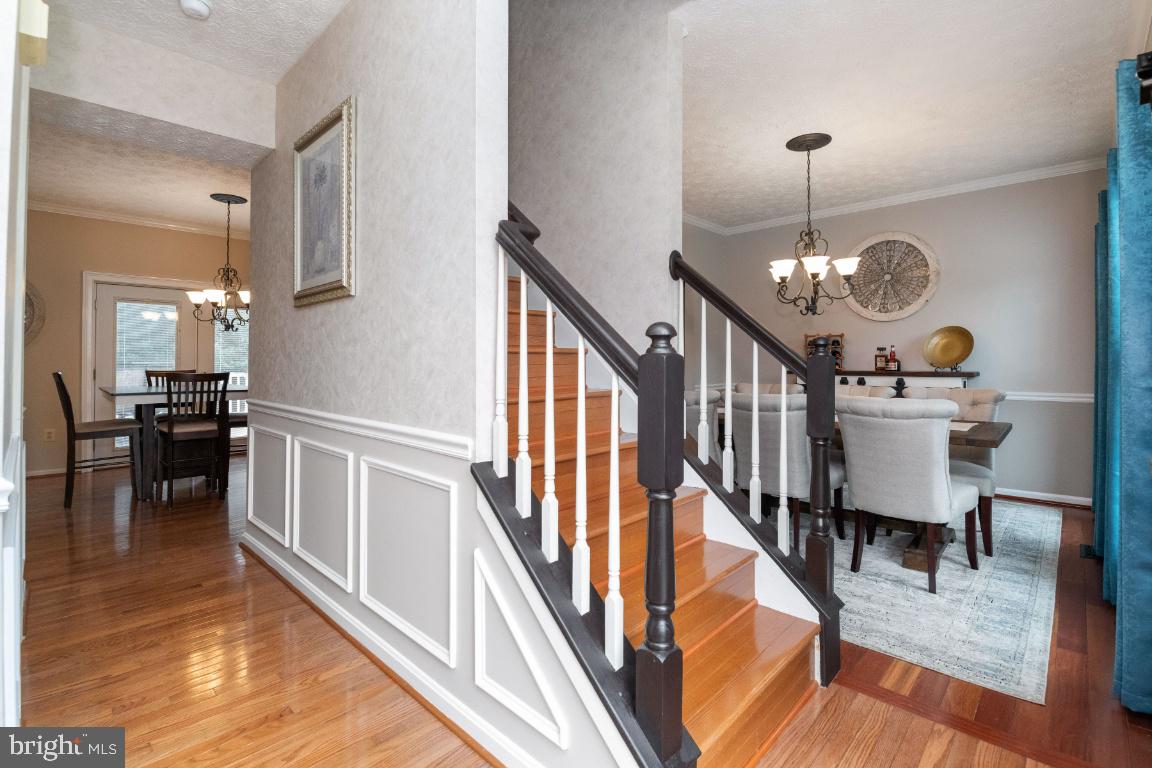 Foyer is open and has hardwood floors