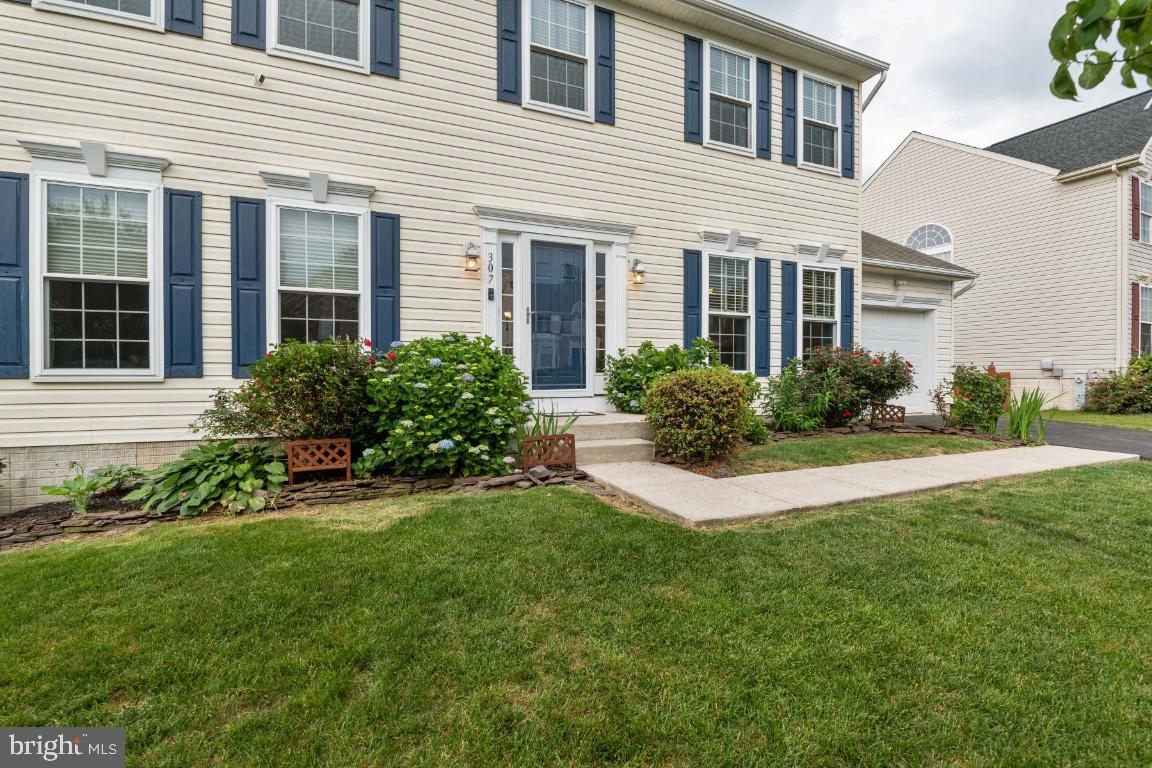 307 Spry Island Road Joppa, MD 21085 - Photo 40 of 46 Front walkway with professional landscaping