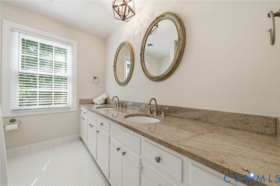 2101 Castlebridge Road Midlothian, VA 23113 - Photo 30 of 37 a bathroom with a granite countertop double vanity sink and a mirror