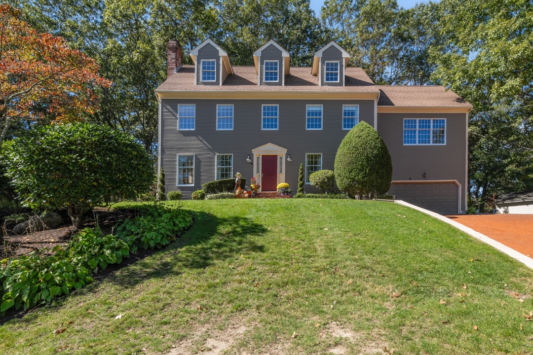 not so traditional center hall colonial; 2 staircases; finished third floor;large yard space, huge deck; whode house generator